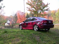 Saab overlooking farm