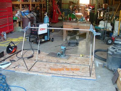 Welding the tumbler cage crossbars